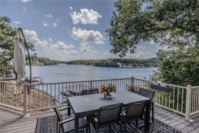 Discover your dream lakefront retreat! This stunning 5,700 sq ft on Bayview Golf Course in Missouri - for sale on GolfHomes.com, golf home, golf lot