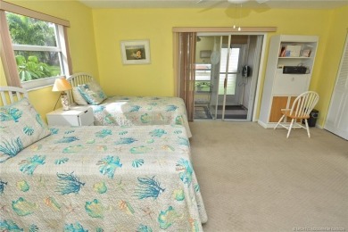 Step into this cozy, beachy-theamed condo and you won't want to on Pine Lakes Golf Club in Florida - for sale on GolfHomes.com, golf home, golf lot