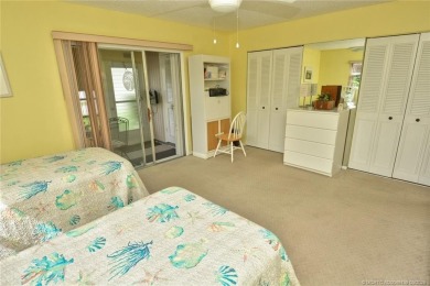 Step into this cozy, beachy-theamed condo and you won't want to on Pine Lakes Golf Club in Florida - for sale on GolfHomes.com, golf home, golf lot