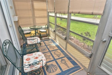 Step into this cozy, beachy-theamed condo and you won't want to on Pine Lakes Golf Club in Florida - for sale on GolfHomes.com, golf home, golf lot