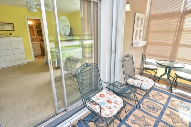 Step into this cozy, beachy-theamed condo and you won't want to on Pine Lakes Golf Club in Florida - for sale on GolfHomes.com, golf home, golf lot