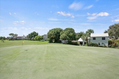 Charming 3-bedroom, 2.5-bath home at 9226 SE Wild Pine Pl on Riverbend Golf Club in Florida - for sale on GolfHomes.com, golf home, golf lot