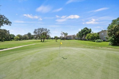 Charming 3-bedroom, 2.5-bath home at 9226 SE Wild Pine Pl on Riverbend Golf Club in Florida - for sale on GolfHomes.com, golf home, golf lot