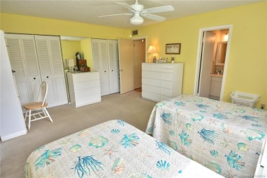 Step into this cozy, beachy-theamed condo and you won't want to on Pine Lakes Golf Club in Florida - for sale on GolfHomes.com, golf home, golf lot