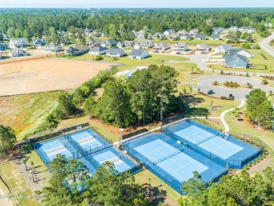 Come build your custom dream home on this beautiful .23 acre lot on Brunswick Plantation and Golf Resorts in North Carolina - for sale on GolfHomes.com, golf home, golf lot