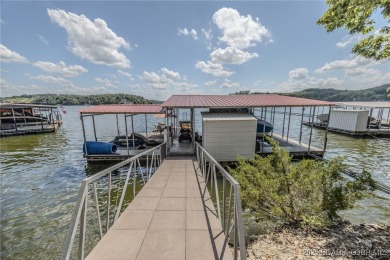 Discover your dream lakefront retreat! This stunning 5,700 sq ft on Bayview Golf Course in Missouri - for sale on GolfHomes.com, golf home, golf lot