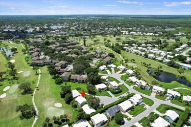 Charming 3-bedroom, 2.5-bath home at 9226 SE Wild Pine Pl on Riverbend Golf Club in Florida - for sale on GolfHomes.com, golf home, golf lot