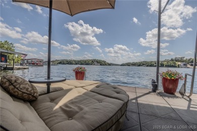 Discover your dream lakefront retreat! This stunning 5,700 sq ft on Bayview Golf Course in Missouri - for sale on GolfHomes.com, golf home, golf lot