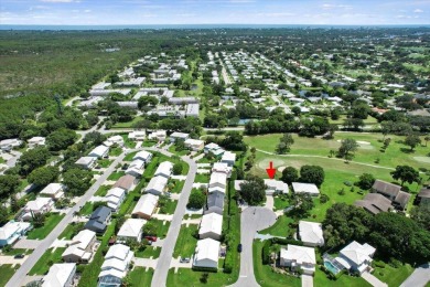 Charming 3-bedroom, 2.5-bath home at 9226 SE Wild Pine Pl on Riverbend Golf Club in Florida - for sale on GolfHomes.com, golf home, golf lot