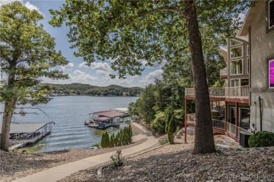 Discover your dream lakefront retreat! This stunning 5,700 sq ft on Bayview Golf Course in Missouri - for sale on GolfHomes.com, golf home, golf lot