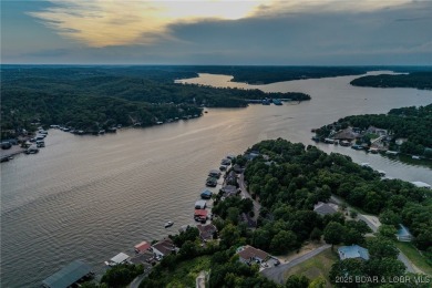 Discover your dream lakefront retreat! This stunning 5,700 sq ft on Bayview Golf Course in Missouri - for sale on GolfHomes.com, golf home, golf lot