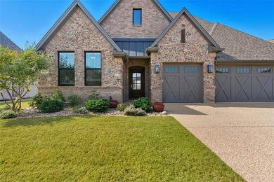 This stunning Pecan Plantation home offers peaceful views of a on Pecan Plantation Country Club in Texas - for sale on GolfHomes.com, golf home, golf lot