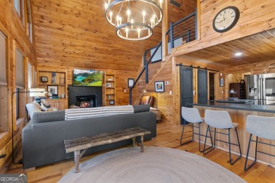 Nestled atop a gentle hill and surrounded by graceful Hemlocks on White Path Golf Club in Georgia - for sale on GolfHomes.com, golf home, golf lot