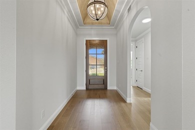 This stunning Pecan Plantation home offers peaceful views of a on Pecan Plantation Country Club in Texas - for sale on GolfHomes.com, golf home, golf lot