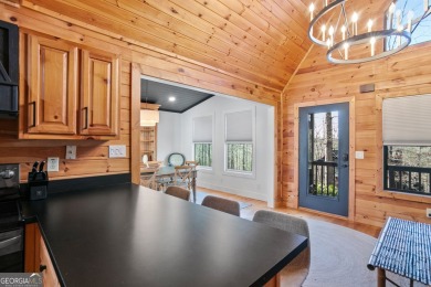 Nestled atop a gentle hill and surrounded by graceful Hemlocks on White Path Golf Club in Georgia - for sale on GolfHomes.com, golf home, golf lot