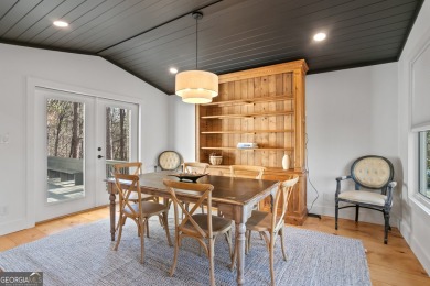 Nestled atop a gentle hill and surrounded by graceful Hemlocks on White Path Golf Club in Georgia - for sale on GolfHomes.com, golf home, golf lot