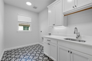 This stunning Pecan Plantation home offers peaceful views of a on Pecan Plantation Country Club in Texas - for sale on GolfHomes.com, golf home, golf lot