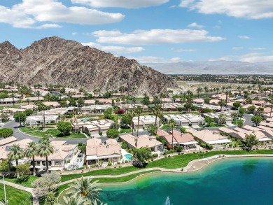 The home is located in the Guard Gated Lake community of Laguna on La Quinta Golf  Resort and Country Clubs in California - for sale on GolfHomes.com, golf home, golf lot