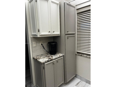 Beautifully furnished unit in 55+ community overlooking the golf on Oriole Golf and Tennis Club in Florida - for sale on GolfHomes.com, golf home, golf lot