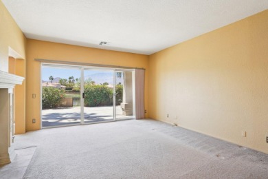 The home is located in the Guard Gated Lake community of Laguna on La Quinta Golf  Resort and Country Clubs in California - for sale on GolfHomes.com, golf home, golf lot