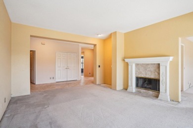 The home is located in the Guard Gated Lake community of Laguna on La Quinta Golf  Resort and Country Clubs in California - for sale on GolfHomes.com, golf home, golf lot
