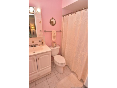 This first floor one bedroom, corner location with one and a on Pine Lakes Golf Club in Florida - for sale on GolfHomes.com, golf home, golf lot