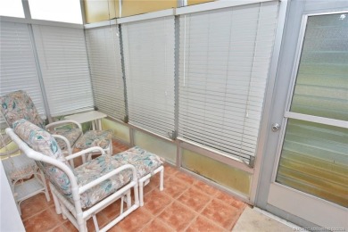 This first floor one bedroom, corner location with one and a on Pine Lakes Golf Club in Florida - for sale on GolfHomes.com, golf home, golf lot