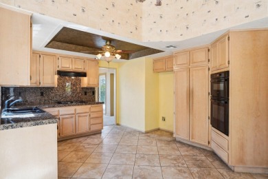 The home is located in the Guard Gated Lake community of Laguna on La Quinta Golf  Resort and Country Clubs in California - for sale on GolfHomes.com, golf home, golf lot