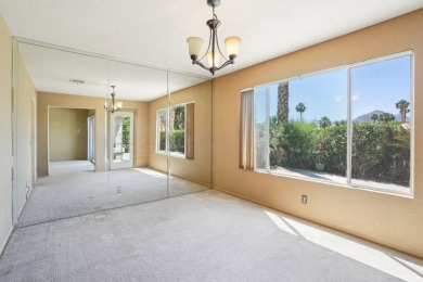 The home is located in the Guard Gated Lake community of Laguna on La Quinta Golf  Resort and Country Clubs in California - for sale on GolfHomes.com, golf home, golf lot