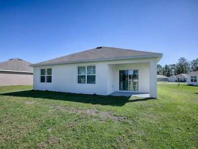 Welcome to this beautifully crafted, nearly brand-new home on Lake Diamond Golf and Country Club in Florida - for sale on GolfHomes.com, golf home, golf lot