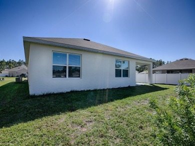 Welcome to this beautifully crafted, nearly brand-new home on Lake Diamond Golf and Country Club in Florida - for sale on GolfHomes.com, golf home, golf lot