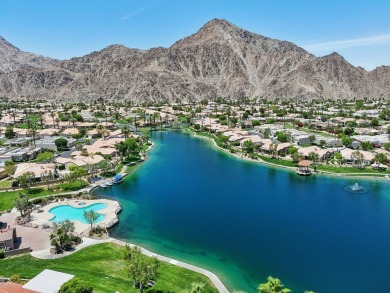 The home is located in the Guard Gated Lake community of Laguna on La Quinta Golf  Resort and Country Clubs in California - for sale on GolfHomes.com, golf home, golf lot
