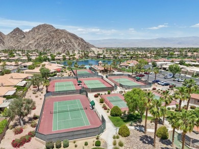 The home is located in the Guard Gated Lake community of Laguna on La Quinta Golf  Resort and Country Clubs in California - for sale on GolfHomes.com, golf home, golf lot