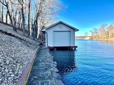 LOCH LOMOND-LAKE LIVING! Private finger cove. Loch Lomond is the on Bella Vista Country Club - Scottsdale in Arkansas - for sale on GolfHomes.com, golf home, golf lot