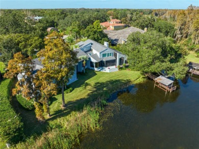 Welcome to this amazing lakefront estate in Avila, Tampa Bay's on Avila Golf and Country Club in Florida - for sale on GolfHomes.com, golf home, golf lot