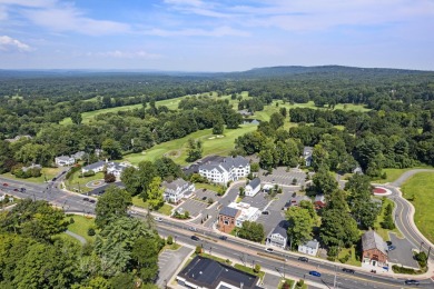Welcome to this beautifully maintained and charming 2-Bedroom + on Country Club of Farmington in Connecticut - for sale on GolfHomes.com, golf home, golf lot