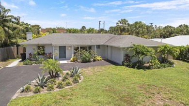 Discover coastal living at its finest in this beautifully on North Palm Beach Country Club in Florida - for sale on GolfHomes.com, golf home, golf lot