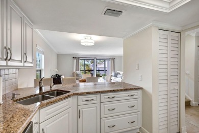 This exceptional corner unit offers a prime location with on Riverbend Golf Club in Florida - for sale on GolfHomes.com, golf home, golf lot