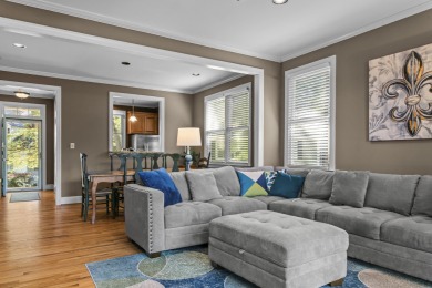 EFFORTLESS RETREAT WITH GOLF COURSE VIEWS AND INCOME POTENTIAL on Great Waters Course At Reynolds Plantation in Georgia - for sale on GolfHomes.com, golf home, golf lot