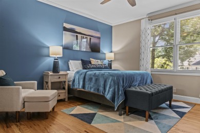 EFFORTLESS RETREAT WITH GOLF COURSE VIEWS AND INCOME POTENTIAL on Great Waters Course At Reynolds Plantation in Georgia - for sale on GolfHomes.com, golf home, golf lot