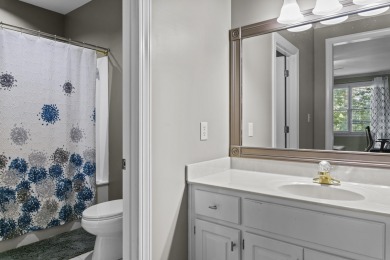 EFFORTLESS RETREAT WITH GOLF COURSE VIEWS AND INCOME POTENTIAL on Great Waters Course At Reynolds Plantation in Georgia - for sale on GolfHomes.com, golf home, golf lot