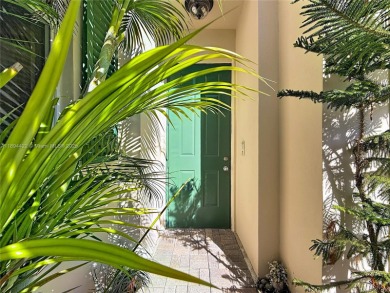 Charming and the largest available courtyard townhome with a on  in Florida - for sale on GolfHomes.com, golf home, golf lot