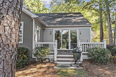 EFFORTLESS RETREAT WITH GOLF COURSE VIEWS AND INCOME POTENTIAL on Great Waters Course At Reynolds Plantation in Georgia - for sale on GolfHomes.com, golf home, golf lot