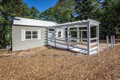 Welcome home in the serene & scenic community of Fairfield Bay on Indian Hills Country Club in Arkansas - for sale on GolfHomes.com, golf home, golf lot