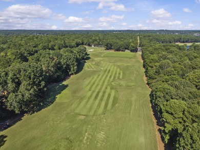 EFFORTLESS RETREAT WITH GOLF COURSE VIEWS AND INCOME POTENTIAL on Great Waters Course At Reynolds Plantation in Georgia - for sale on GolfHomes.com, golf home, golf lot