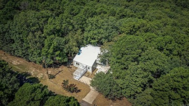 Welcome home in the serene & scenic community of Fairfield Bay on Indian Hills Country Club in Arkansas - for sale on GolfHomes.com, golf home, golf lot