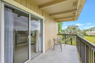 This exceptional corner unit offers a prime location with on Riverbend Golf Club in Florida - for sale on GolfHomes.com, golf home, golf lot