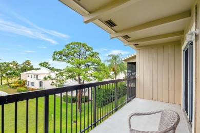 This exceptional corner unit offers a prime location with on Riverbend Golf Club in Florida - for sale on GolfHomes.com, golf home, golf lot