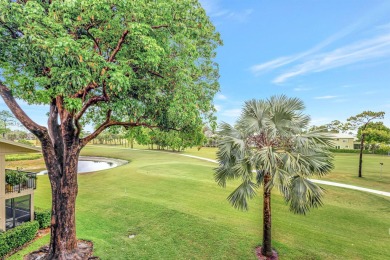 This exceptional corner unit offers a prime location with on Riverbend Golf Club in Florida - for sale on GolfHomes.com, golf home, golf lot