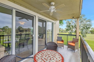 This exceptional corner unit offers a prime location with on Riverbend Golf Club in Florida - for sale on GolfHomes.com, golf home, golf lot